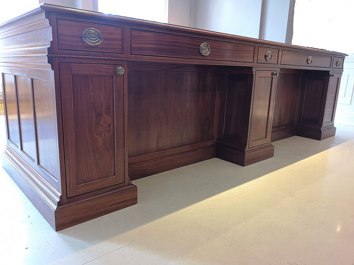 The mahogany reception desk MSO made for the main entrance hall of Chewton Glen