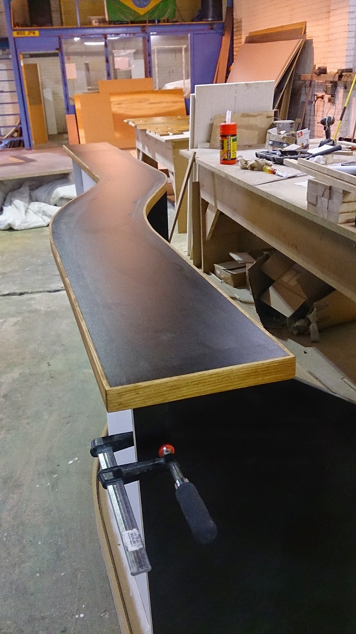 The curved bar of Club Gascon under construction, clamped up in the MSO workshop