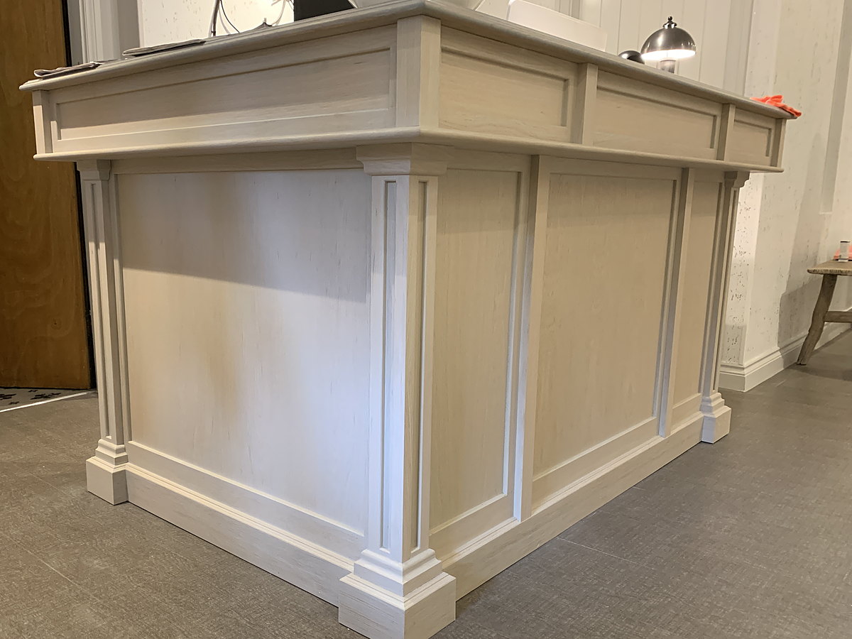 The panelled reception desk MSO designed, built and installed for the Lygon Spa at The Lygon Arms