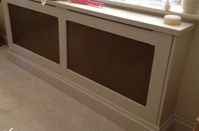 Large white radiator cover